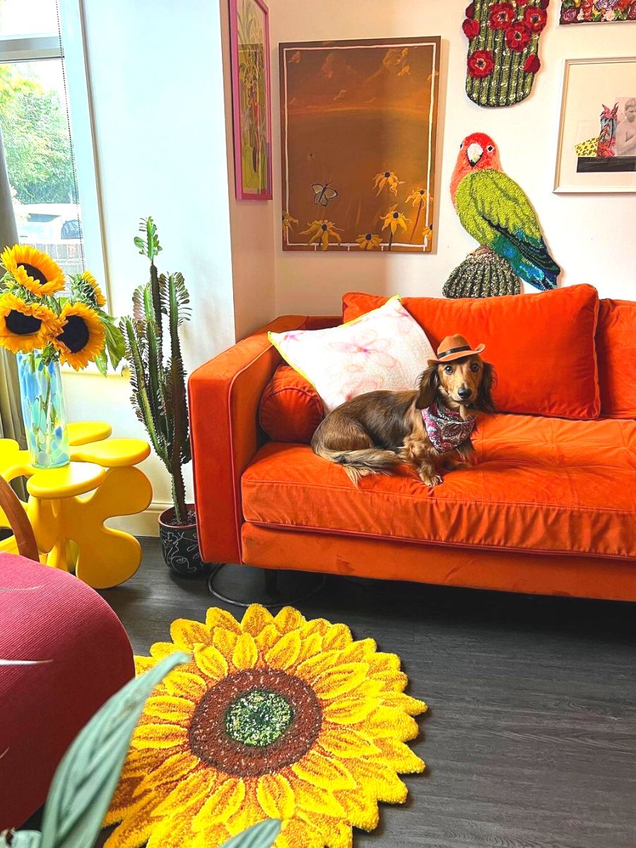 Sunflower along with bird and cacti rug on wall