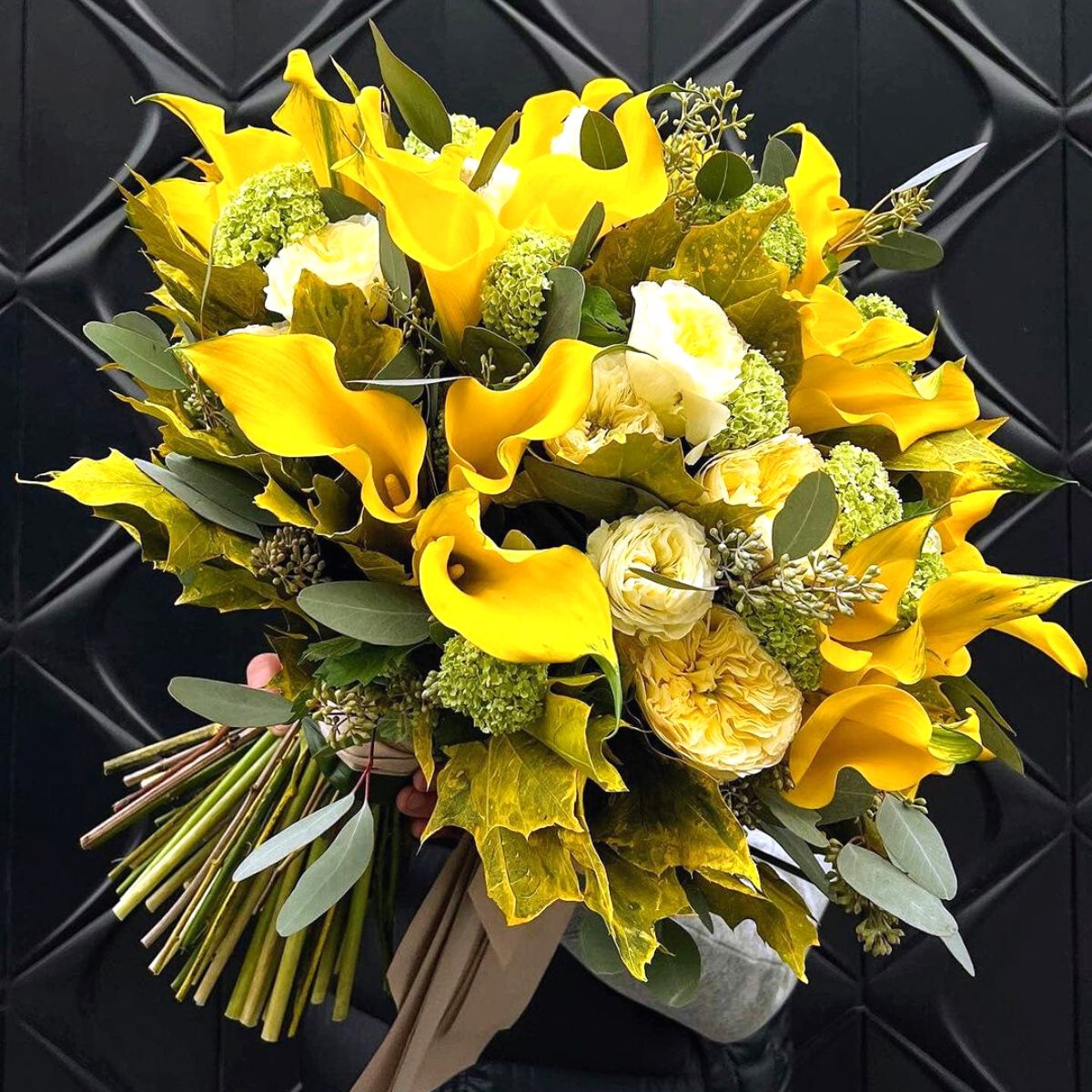 Yellow flower arrangement using yellow calla lily