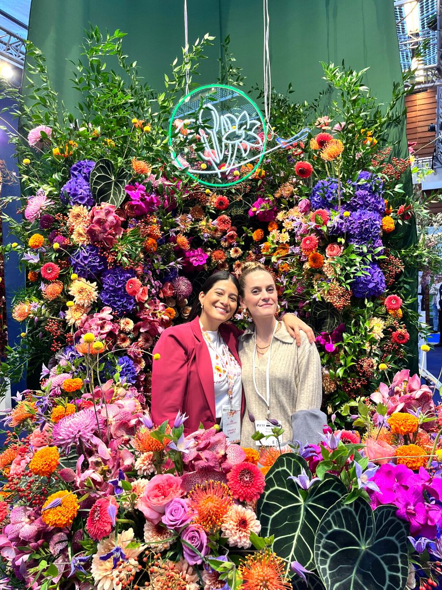 Holex booth filled with colorful flowers