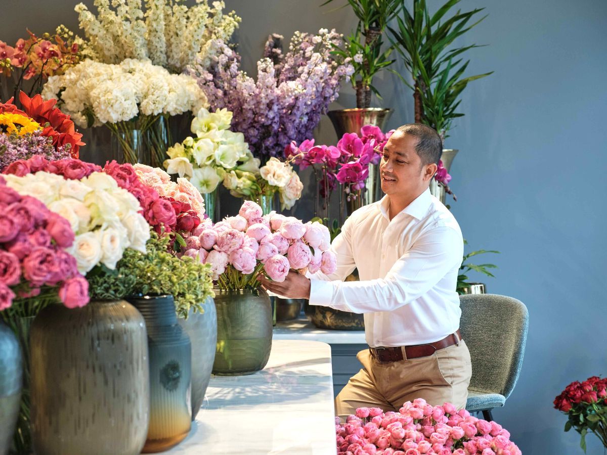 Albert from Darcey Flowers arranging flowers in his shop