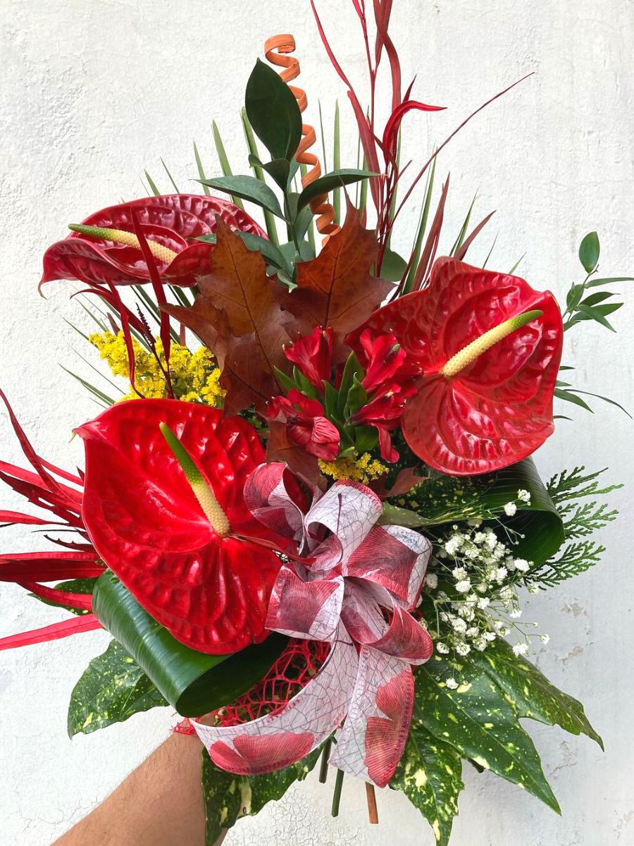 Floral arrangement with red anthuriums