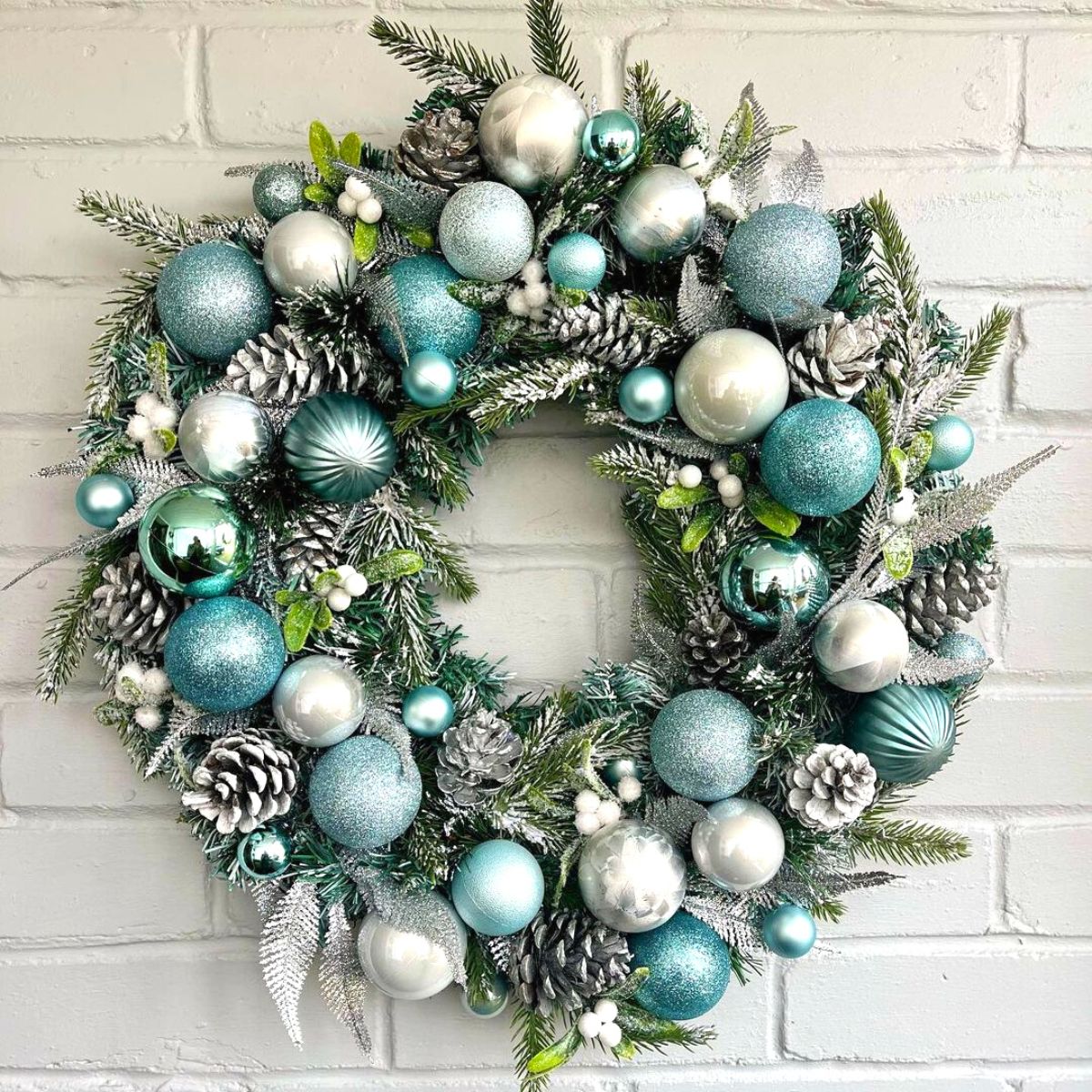 A Christmas wreath in sky blue tones