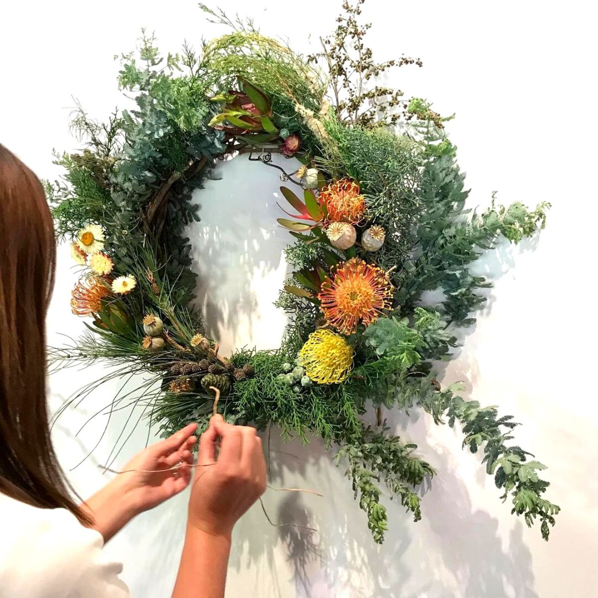A botanical and floral christmas wreath