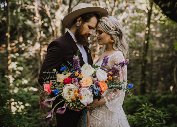 from this Bohemian Whimsy Wedding in the Canadian Woods | bouquet: Bespoke Blossoms | photo: Myrtle and Moss Photography