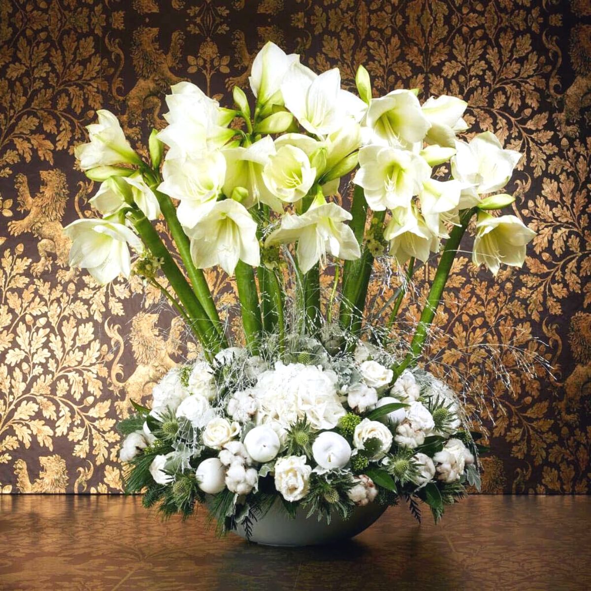 A white amaryllis Christmas floral design