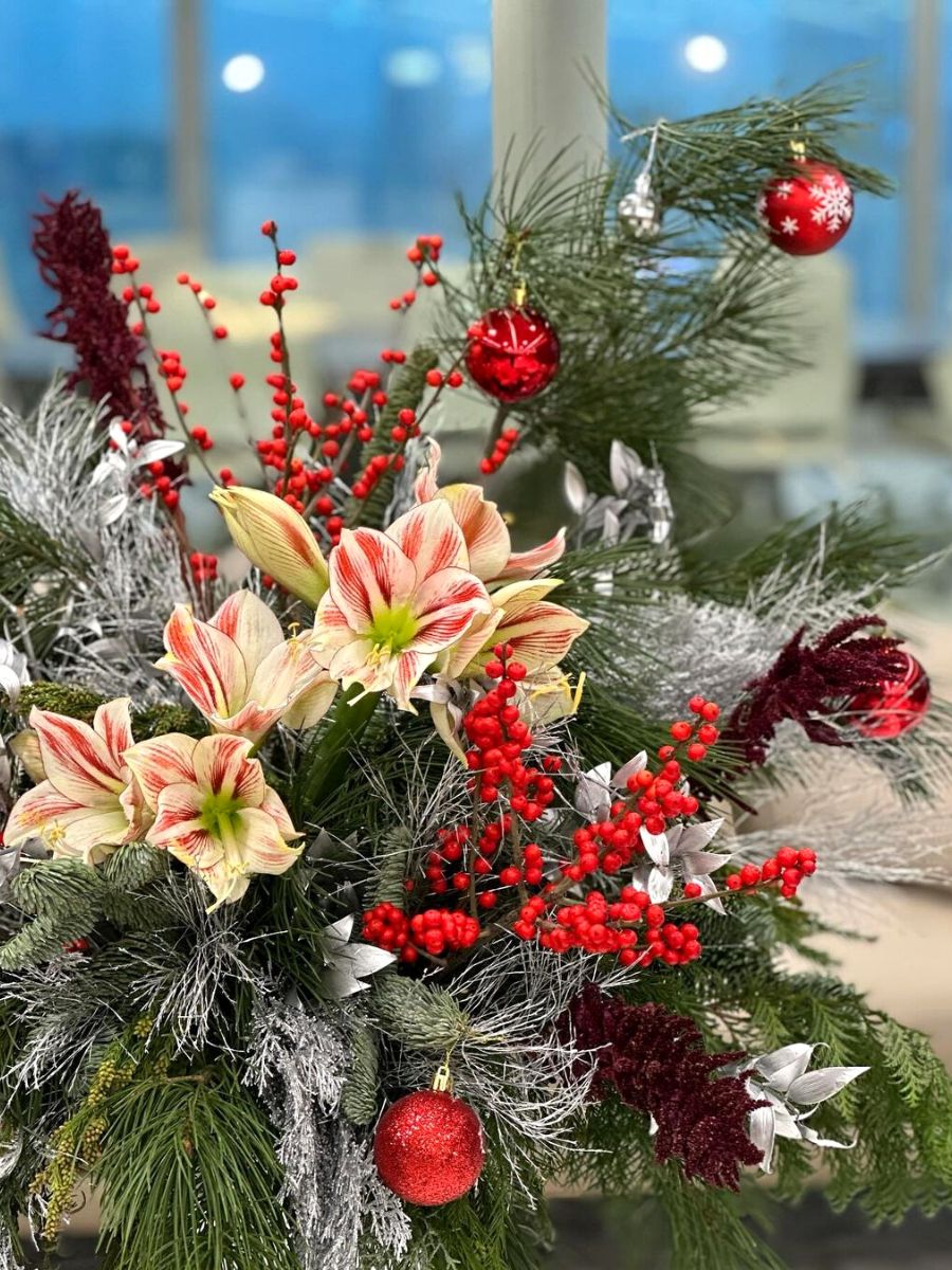 Traditional Christmas floral design in red and silver hues