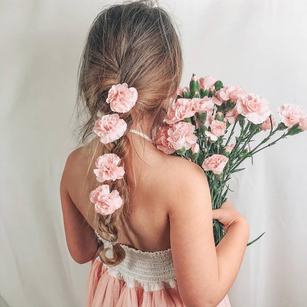 Girl beauty with carnation flower