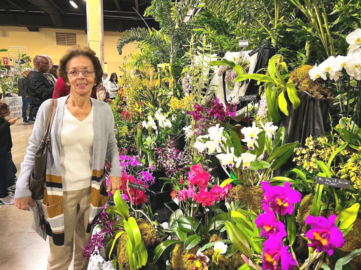 A visitor in last years Tamiami Orchid Festival