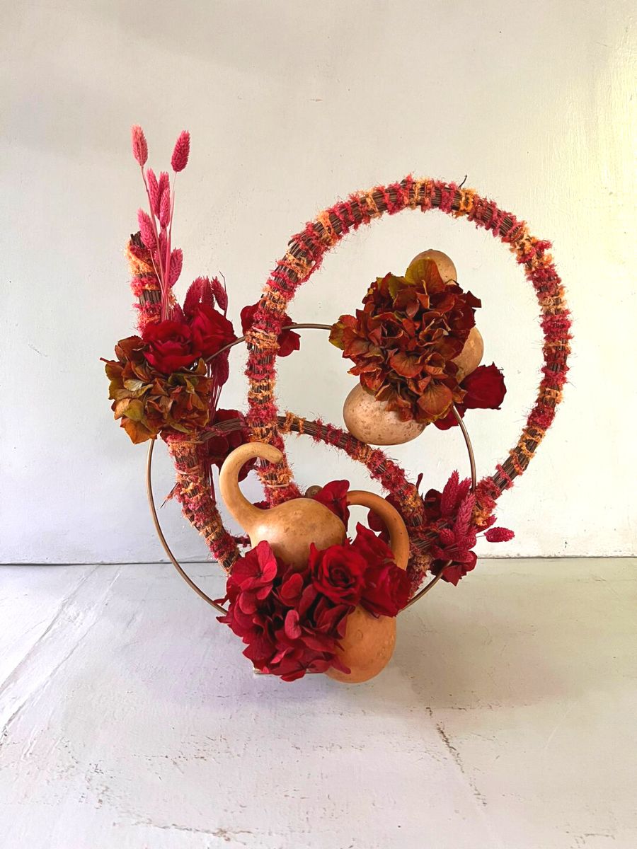Beautiful red toned floral arrangement design by Flowers Naturally