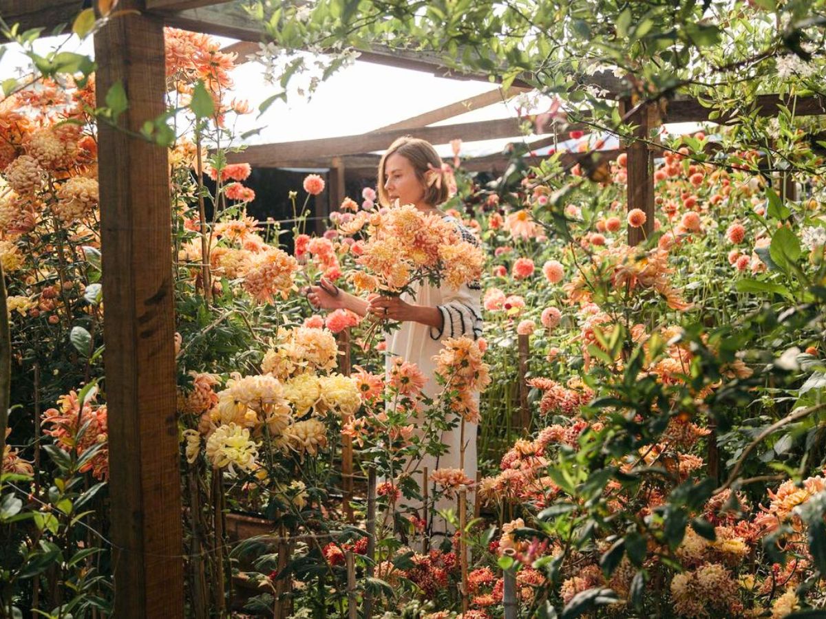 Gabriela Salazar in her flower garden