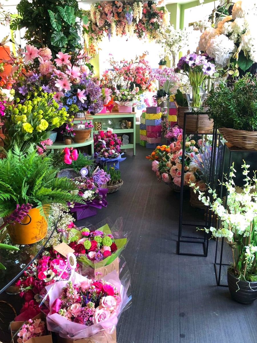 A colorful flower shop with blooms