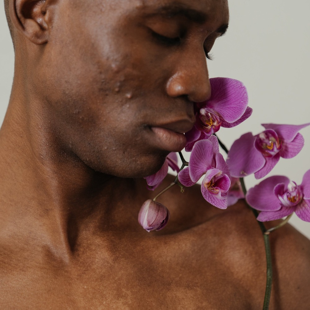Men with orchid flower