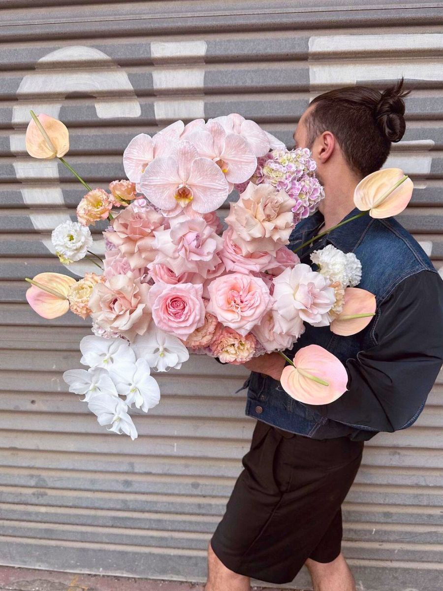 Brett Matthew John creating floral magic in arrangements