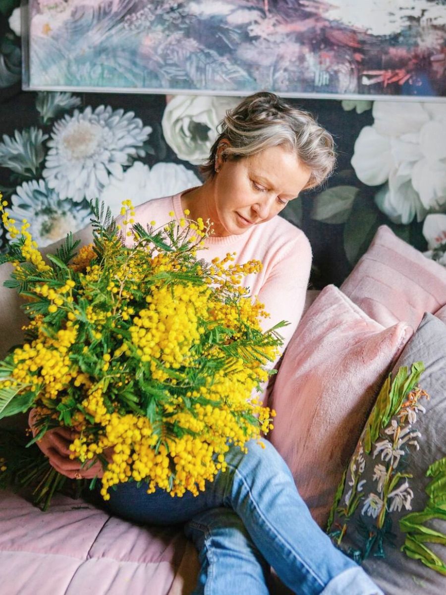 Nikki Tibbles with mimosa flowers for IWD
