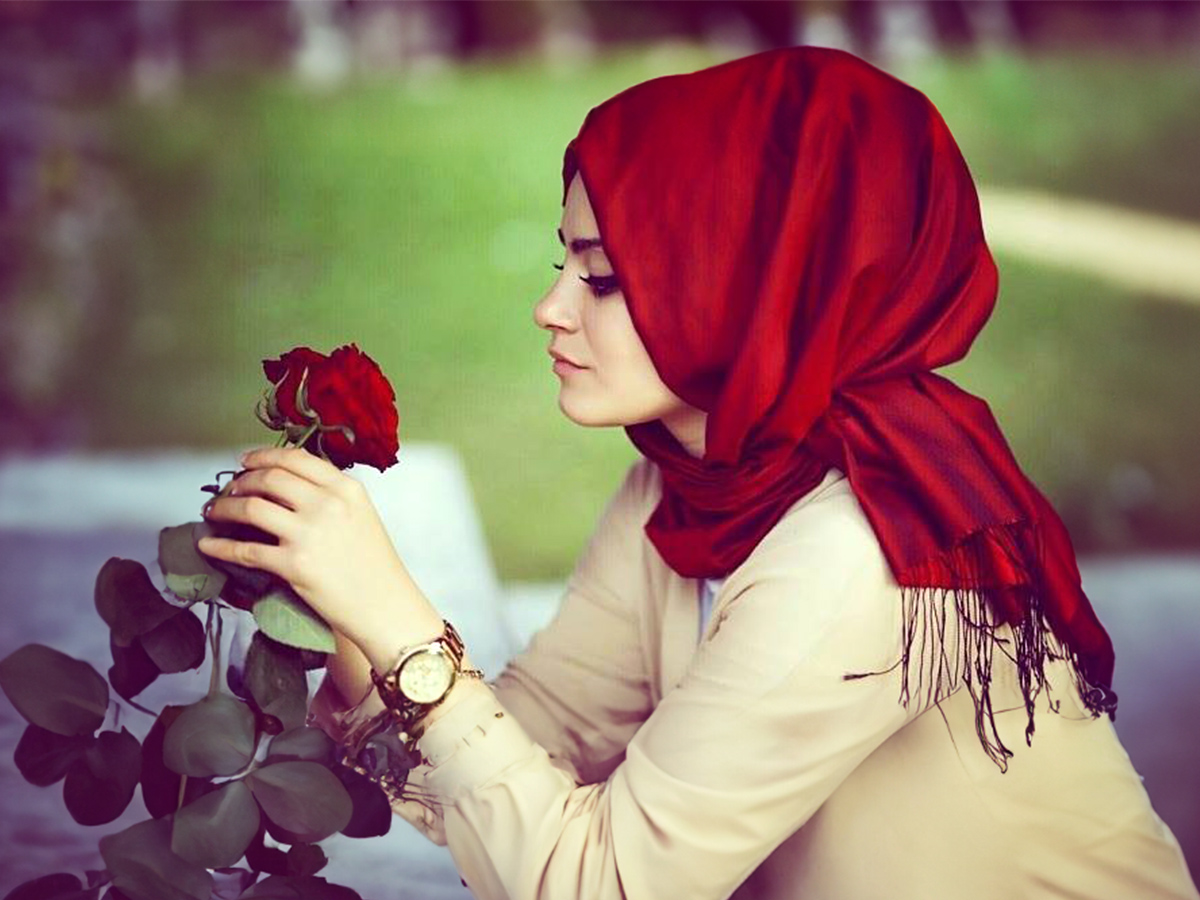Muslim girl with red rose girl