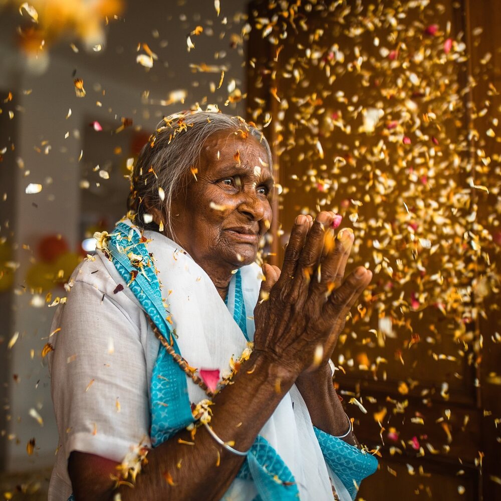 Old women enjoy the Holi Festival