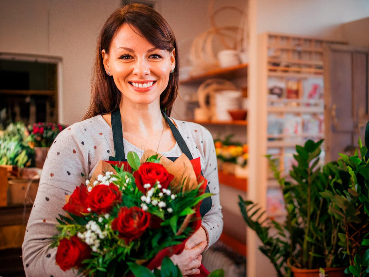 Florist with red rose bouquet on direct2florist