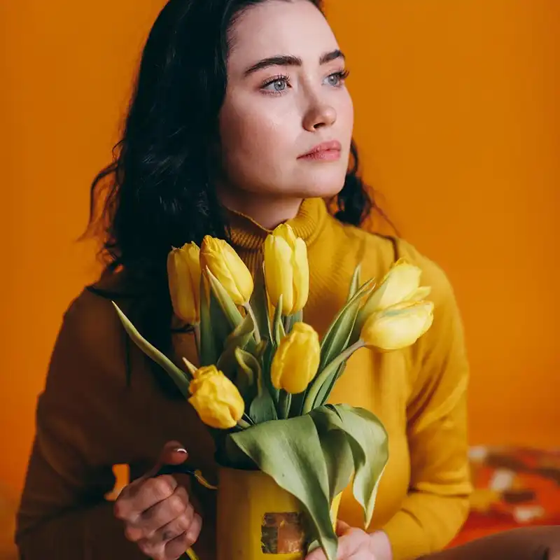 Tulip mania girl with yellow tulips feature on Thursd