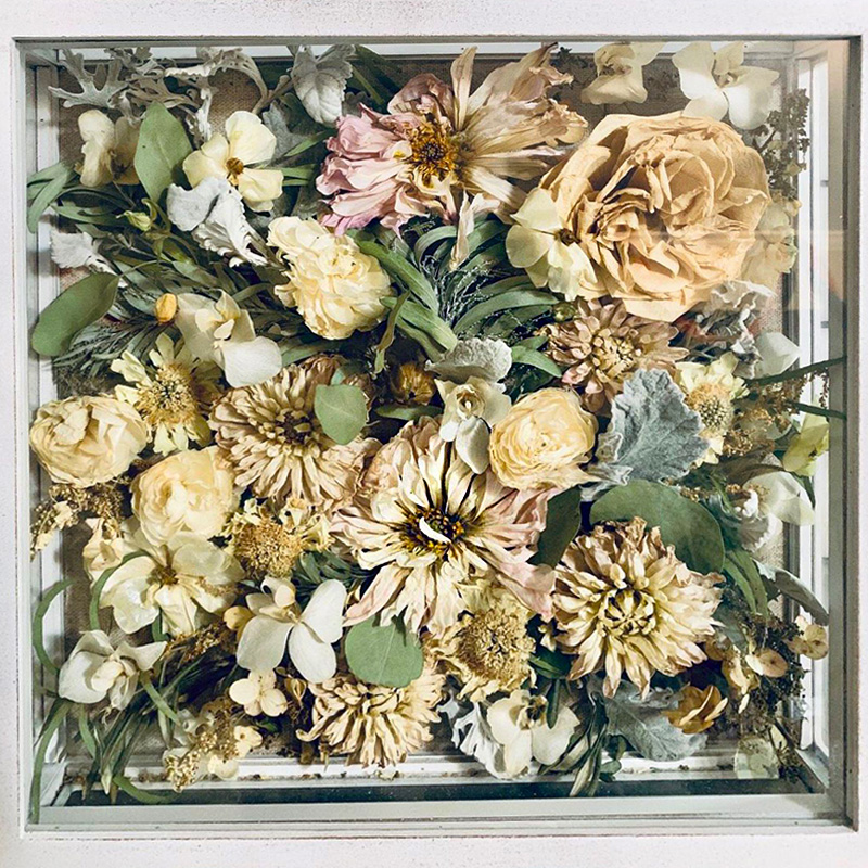 Preserved wedding flowers in a frame on Thursd