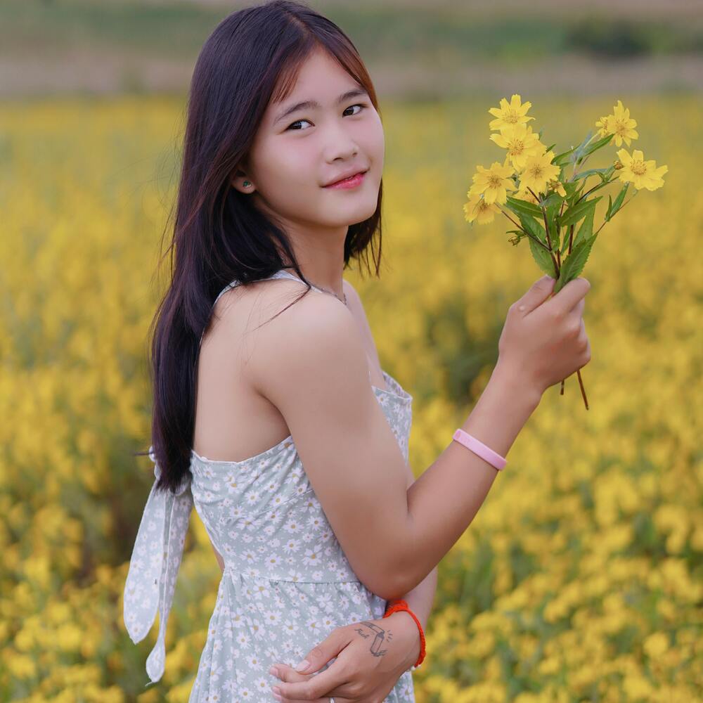 lady at flower field 