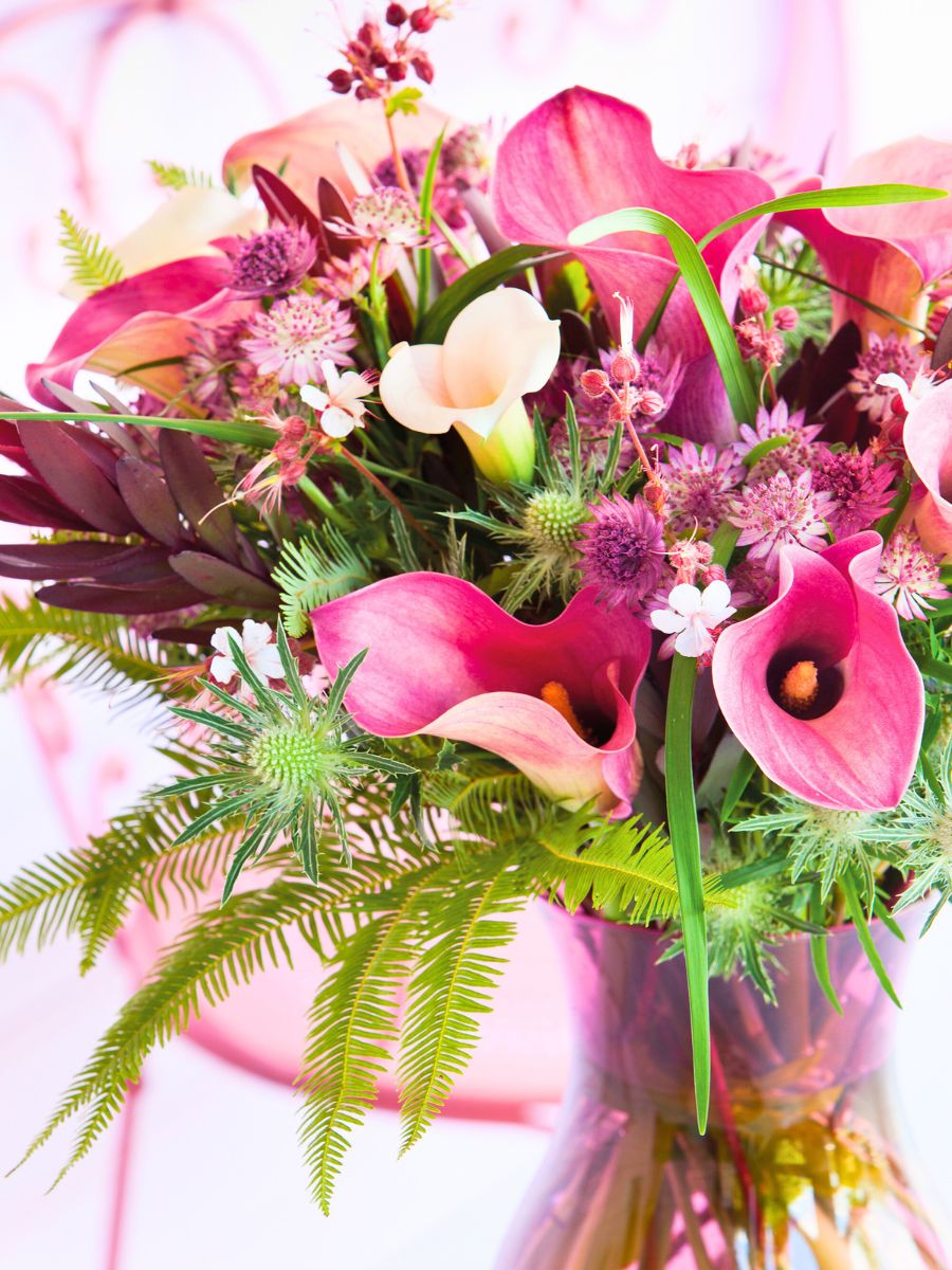 A mix of white and pink calla arrangement