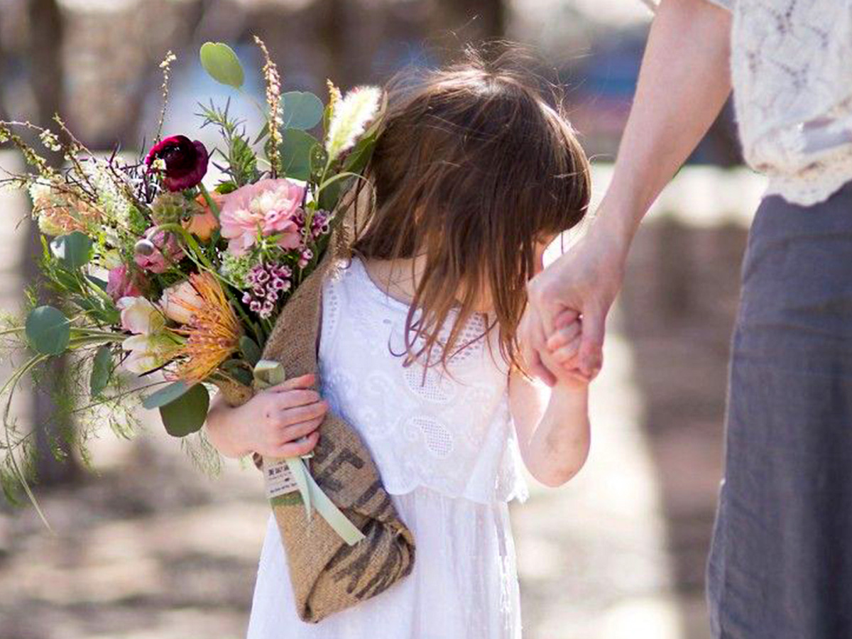 Girl with Mothers Day bouquet from Gardenista