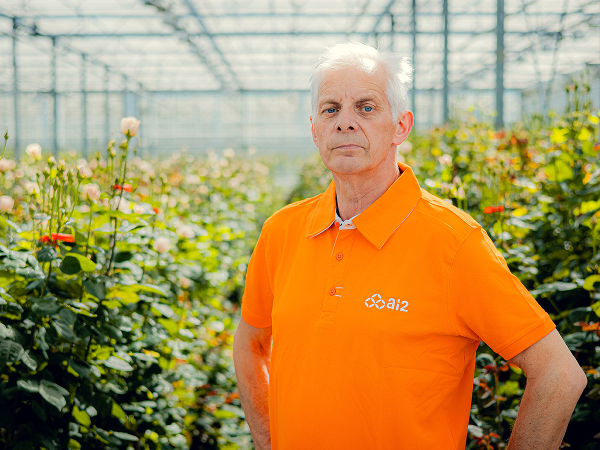 Frank Grunder from Ai2 in roses greenhouse