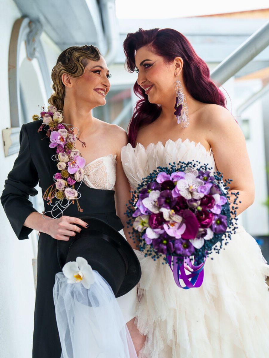 Two Brides With Matching Flowers by Laura Draghici