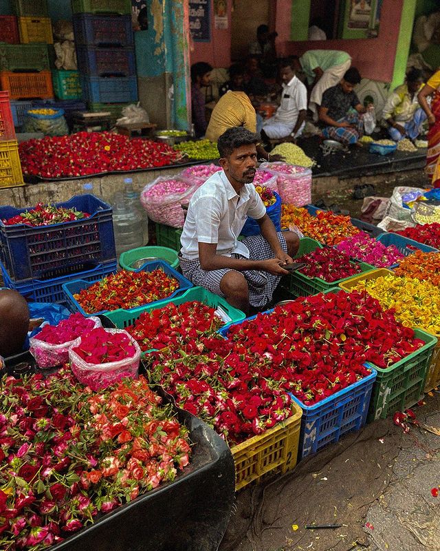 a flower vendor - image from the flower market in Madurai