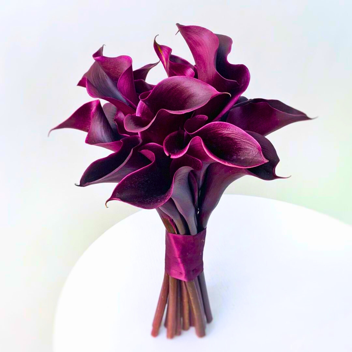 Deep purple calla lily wedding bouquet