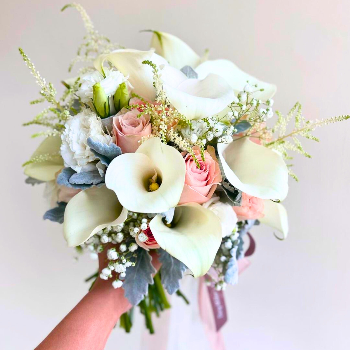 Bright white bridal calla bouquet