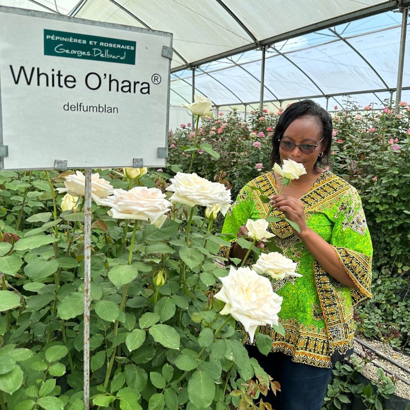 Leah Wahome smelling the roses at Delbard