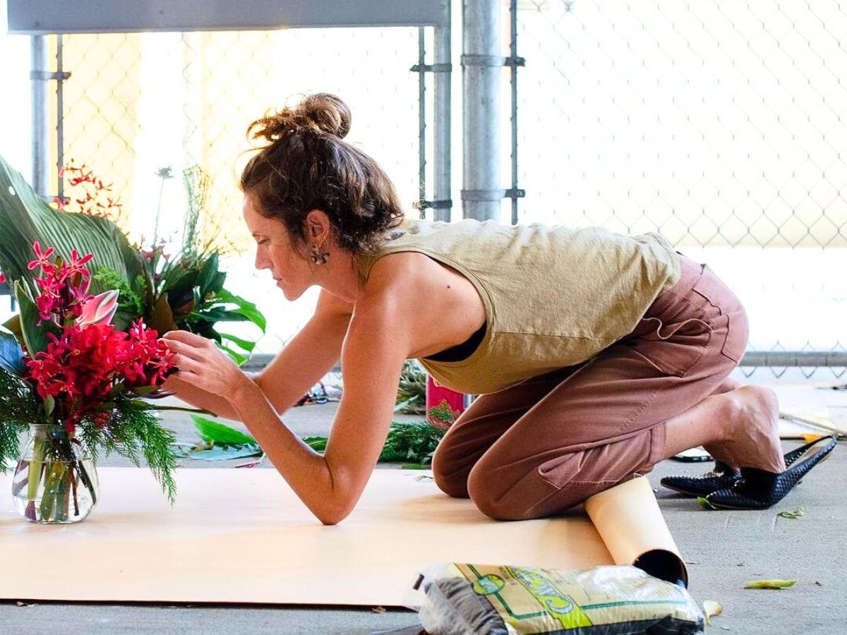 Tamara working on a floral arrangement