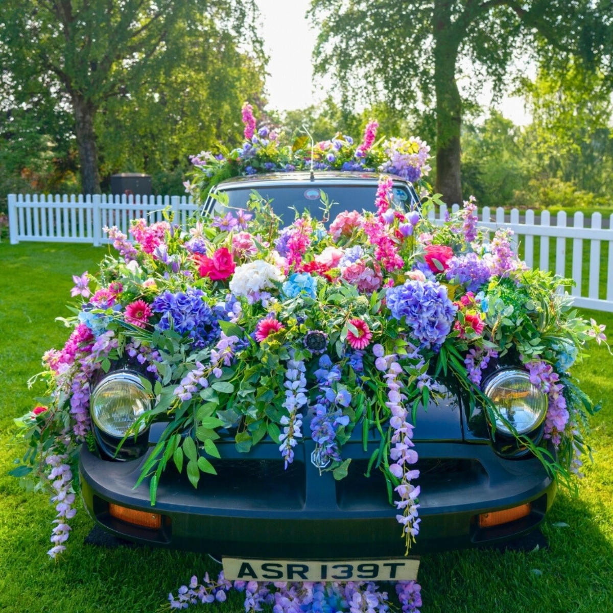 Classic MG car with florals by Penelope Fleurs