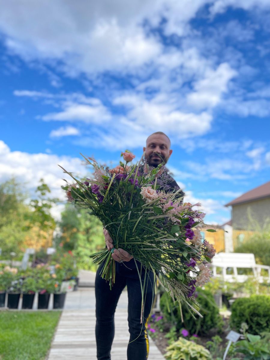 Slava Rosca With Bouquet Lily Grass