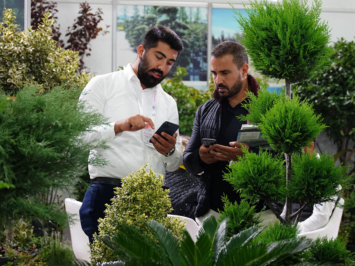 Landscape Istanbul Fair 2023 two men discussing