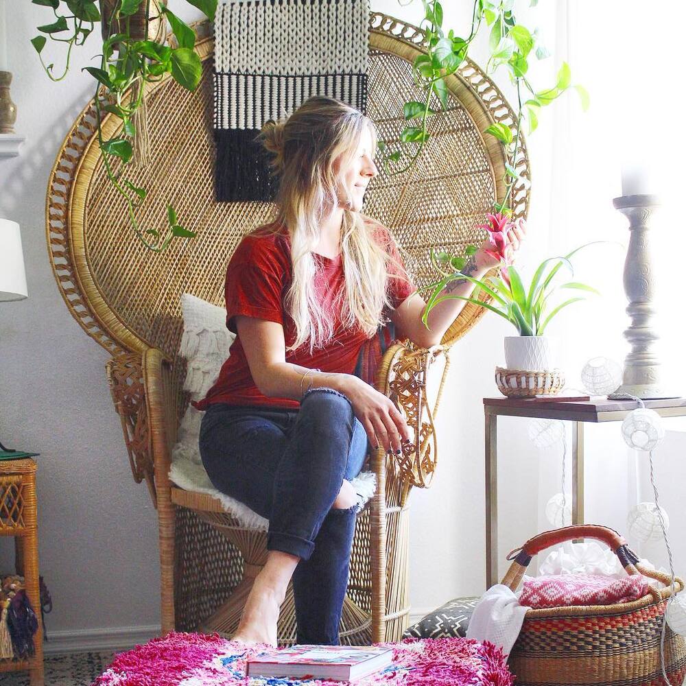 Lady seating with indoor plant