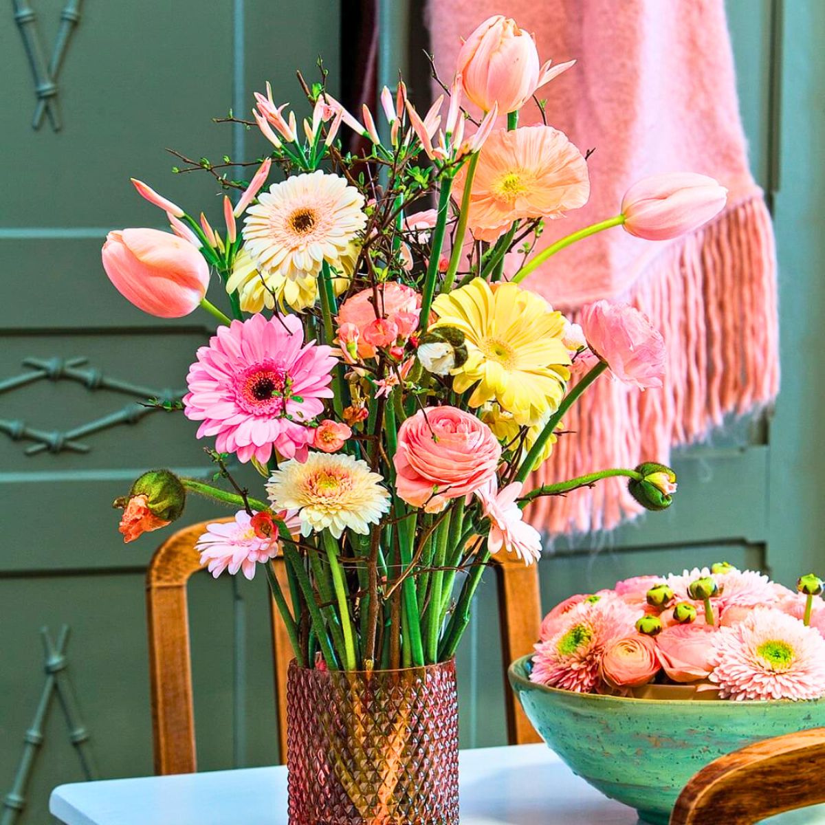 Gerberas in a floral arrangement with other flowers