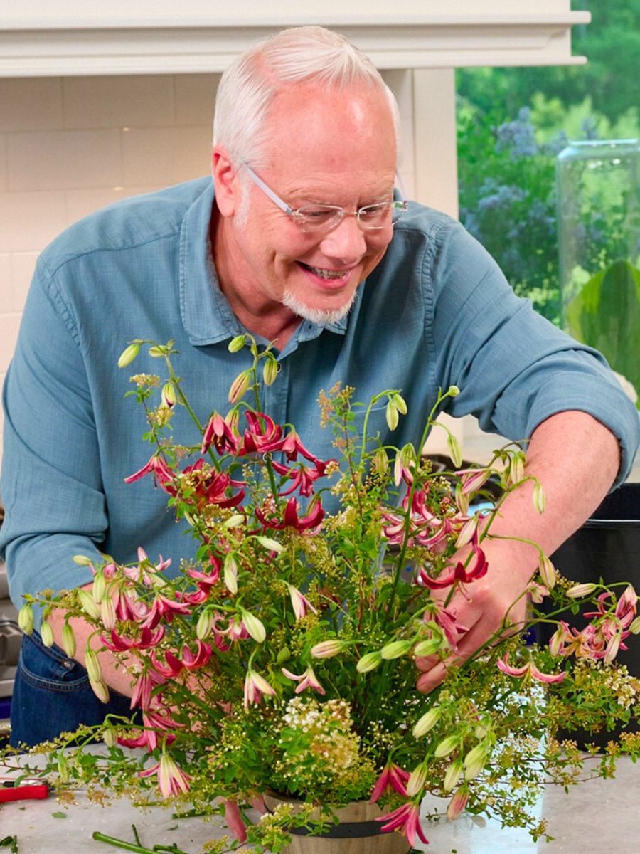 J Schwanke arranging flowers