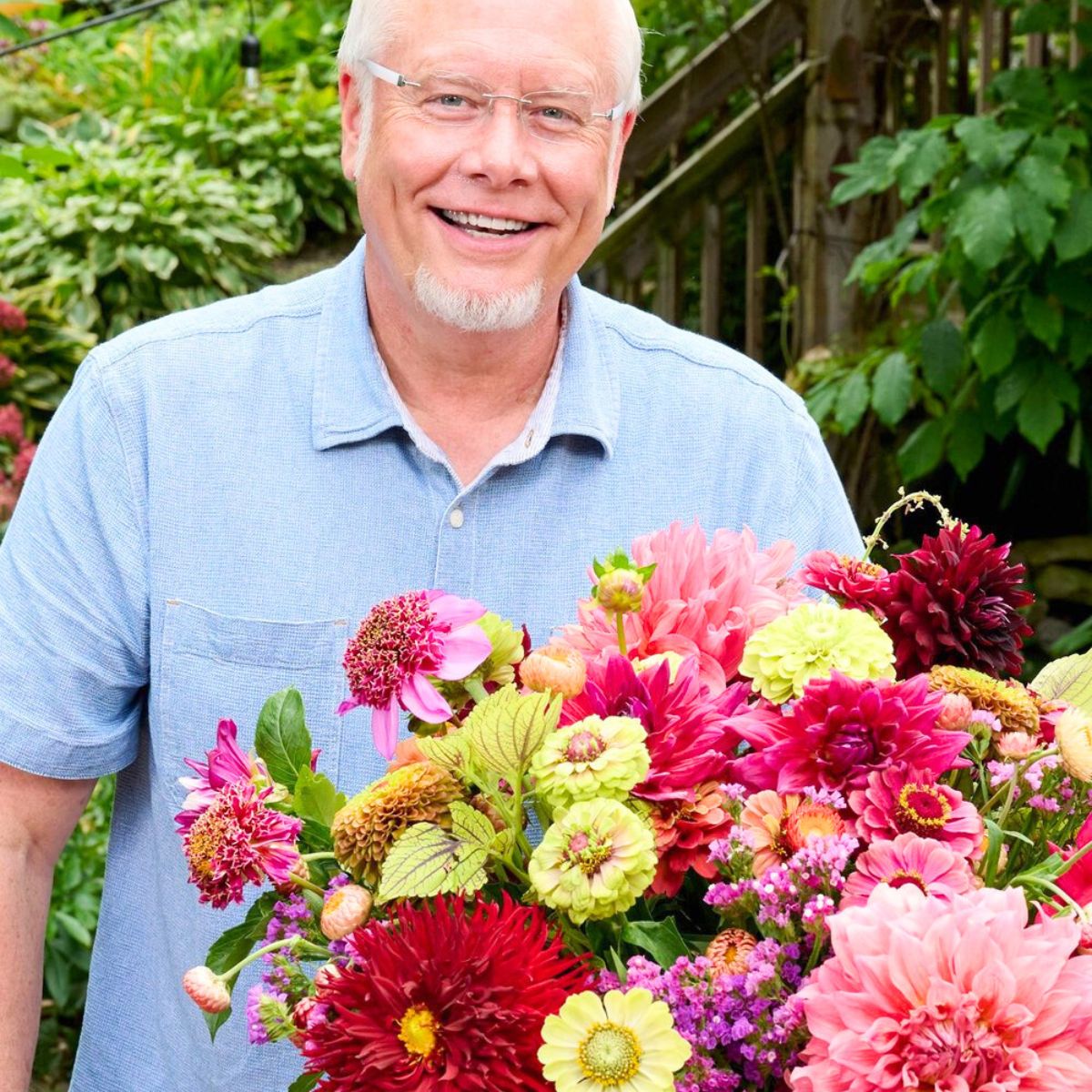 J Schwanke with colorful flowers