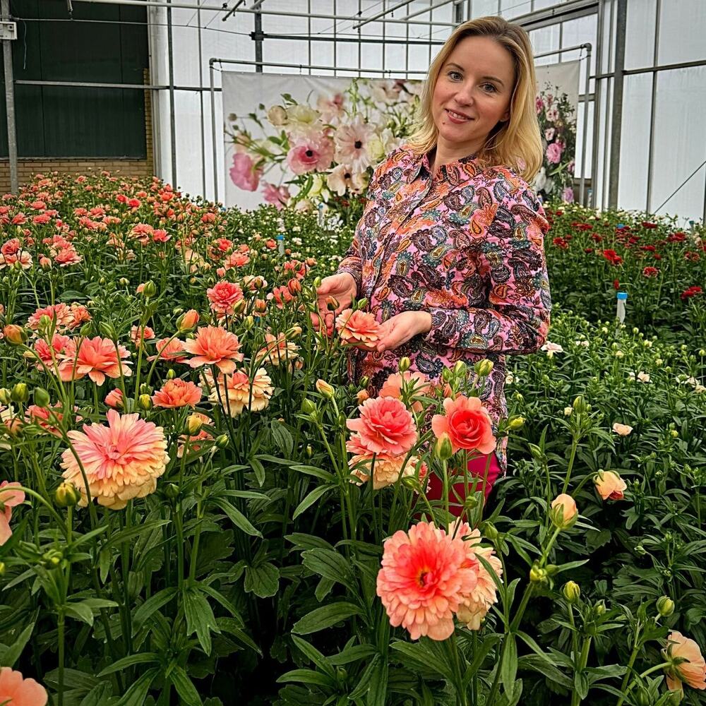  Katya Hutter with Ranunculus flower