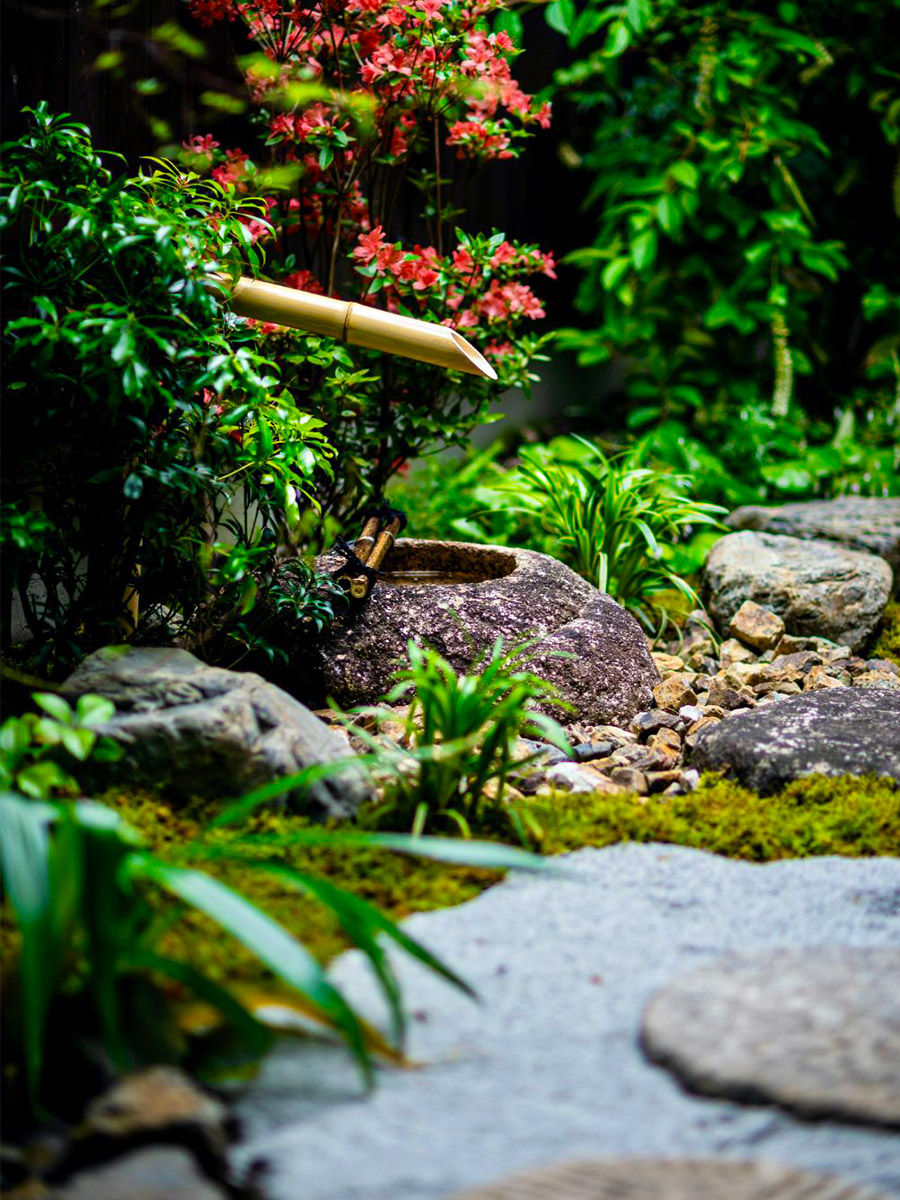 Tsukubai at machiya gardens by machiyajapan