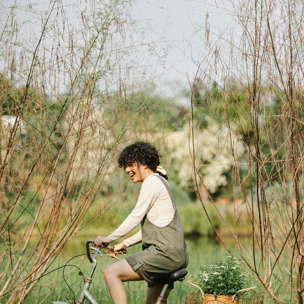 Lady carry plant to new place