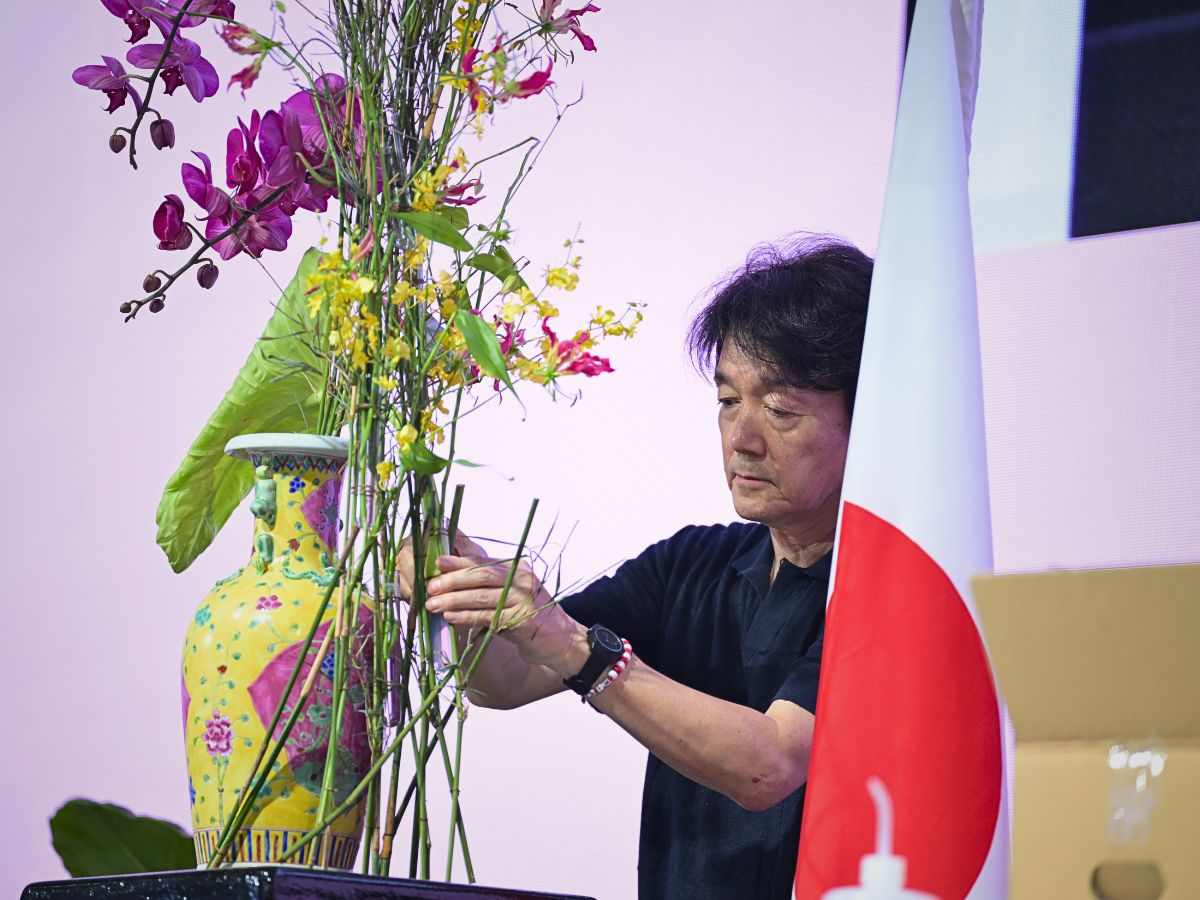 Hiroto Inoue Japan working on his display during the finals of the Floral Windows to the World Championship