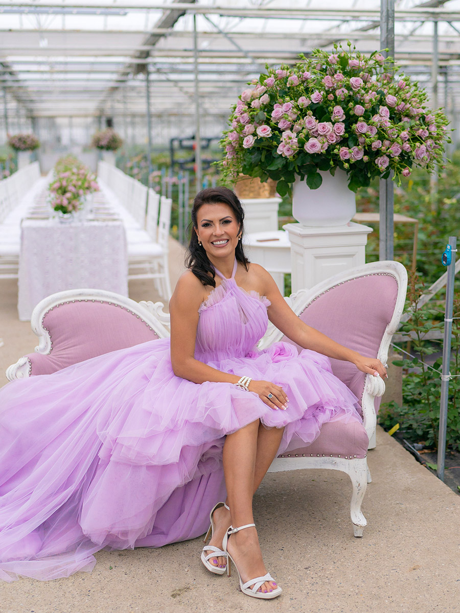 Nadia Duran on a couch in the Voorn greenhouse