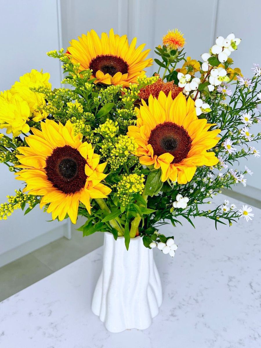 Arrangement of sunflowers in a kitchen table