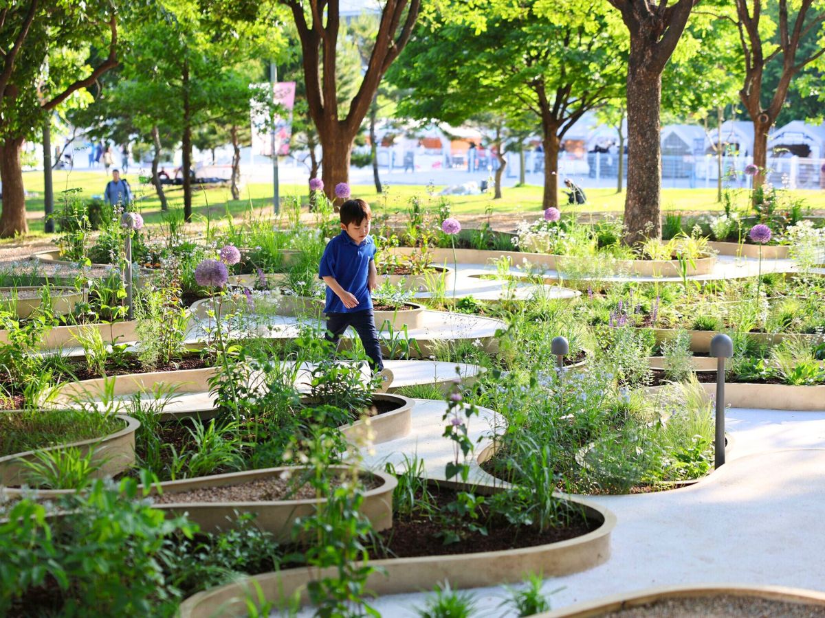 Kid enjoying the new public garden spaces