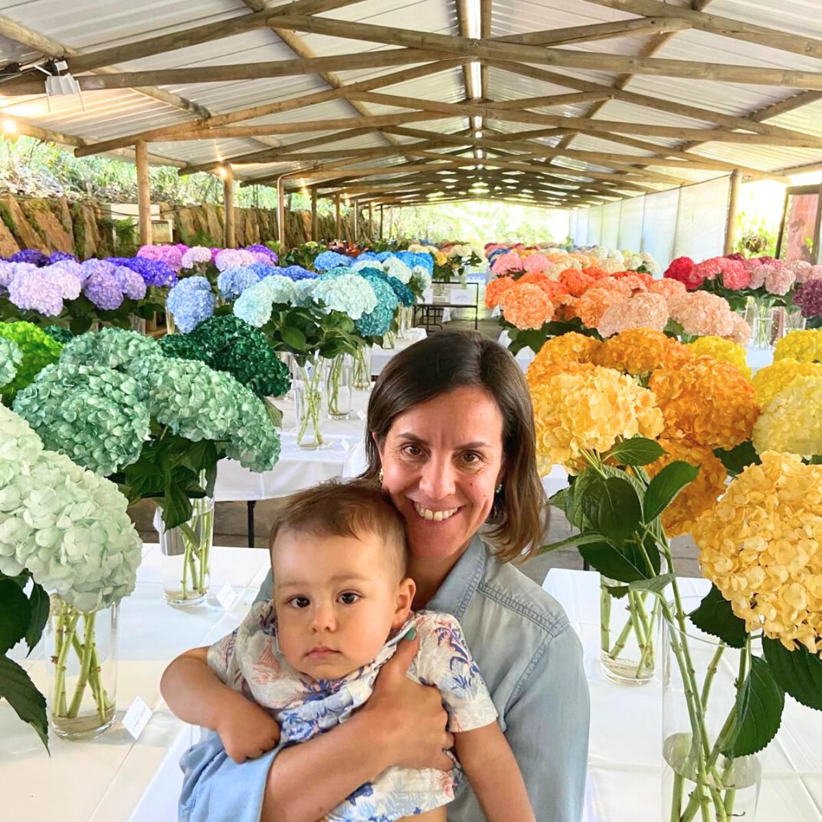 Angela surrounded by hydrangeas