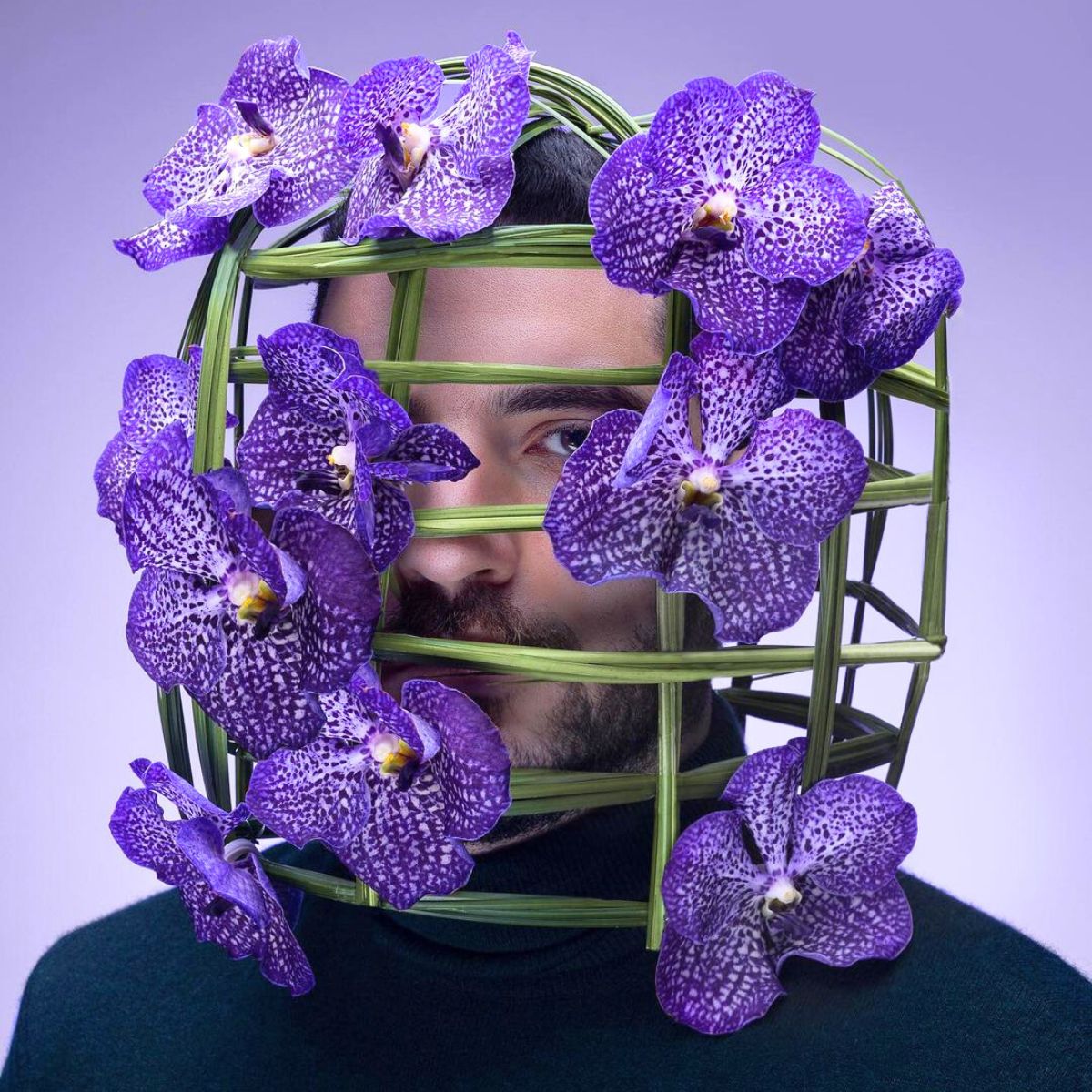 Adbulaziz with a vanda orchid purple design