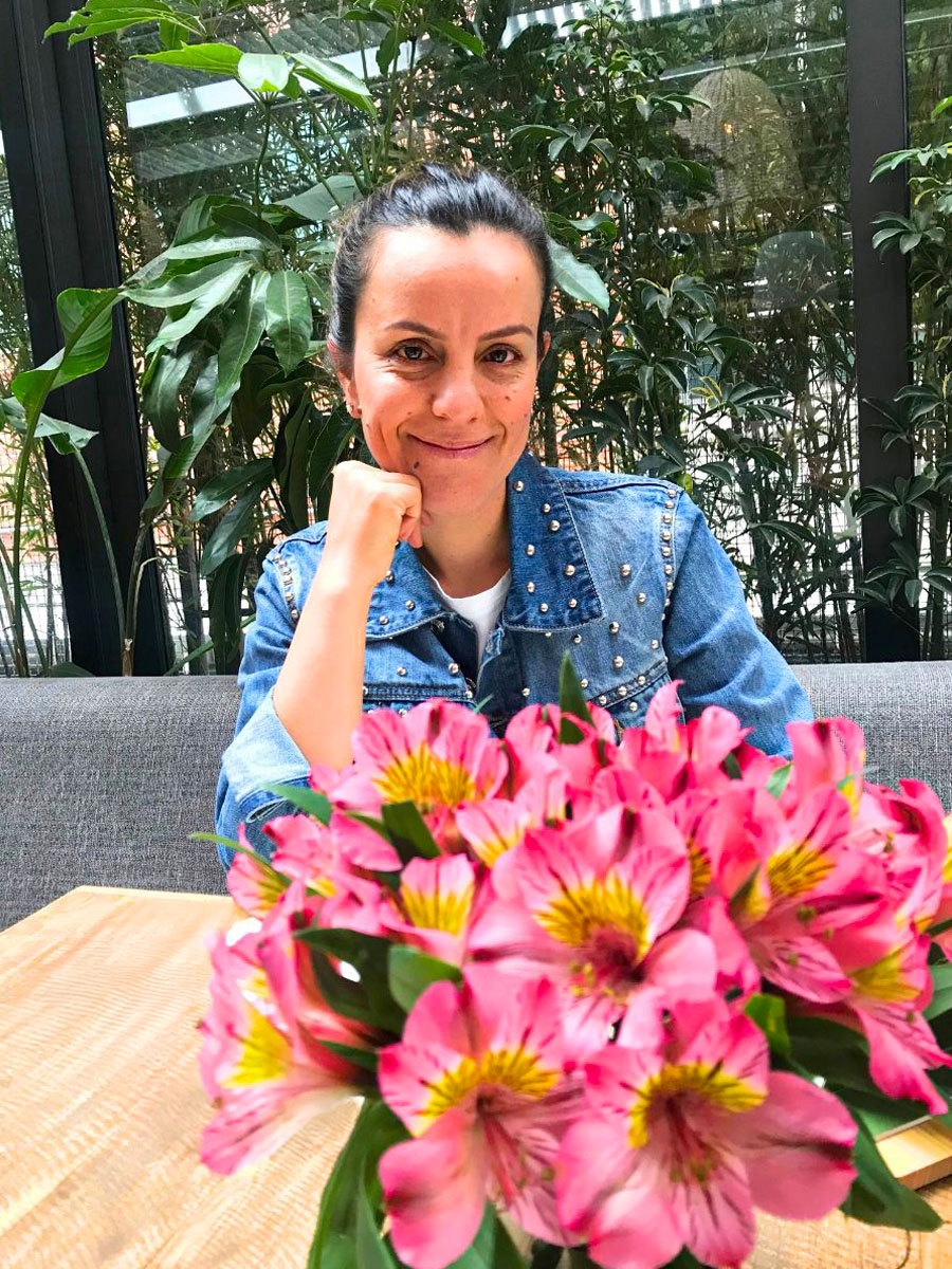 Angela Escobar with pink Alstroemerias